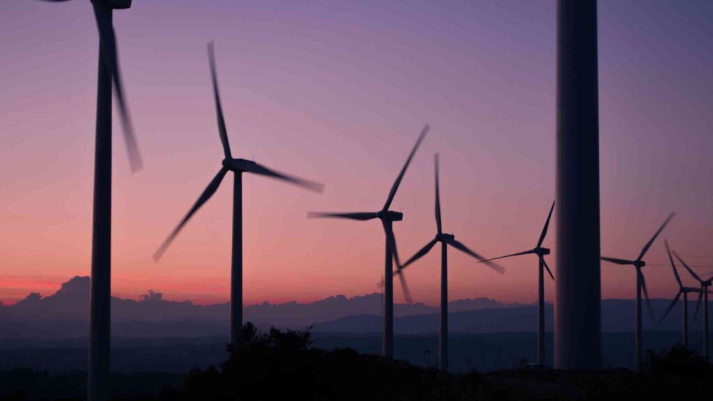 Wind farm with sunset in background